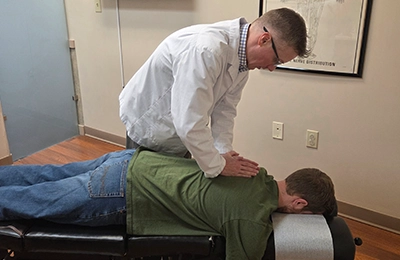 Andrew Pitcher giving a Back Adjustment