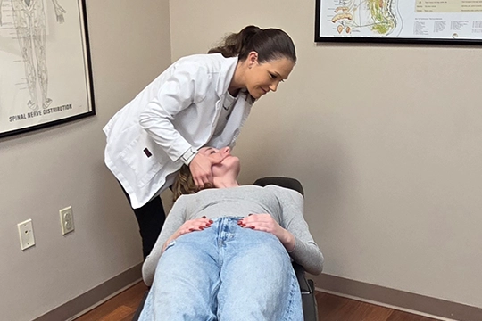 Crystal Gray giving a neck adjustment.